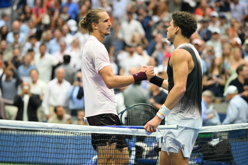 USA's Ben Shelton (R) shakes Germany's Alexander Zverev's hand after the men's singles final tennis match on day fifteen of the US Open tennis tournament at the USTA Billie Jean King National Tennis Center in New York City on September 13, 2026. (Photo by ANGELA WEISS / AFP via Getty Images)