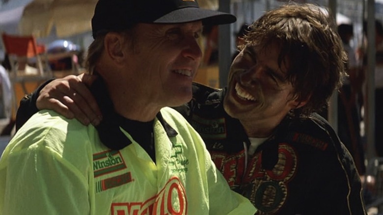 Robert Duvall as Harry Hogge and Tom Cruise as Cole Trickle celebrate victory in Days of Thunder