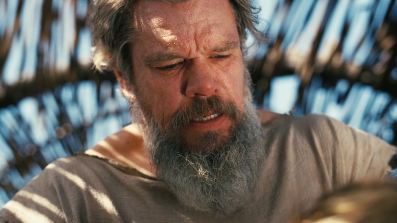 A distraught Matt Damon sports a thick salt-and-pepper beard as Odysseus in The Odyssey
