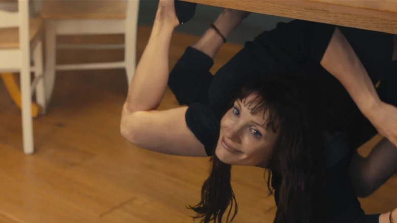 Other Mommy twists herself into a weird shape in Other Mommy
