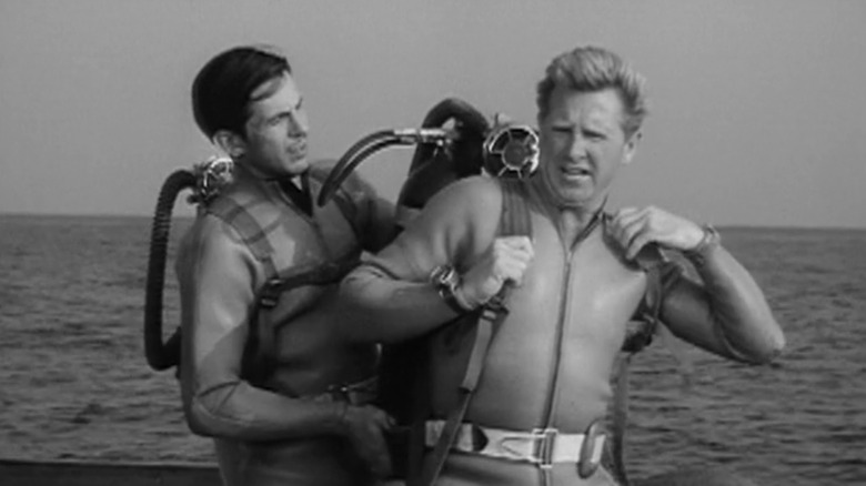 Leonard Nimoy's Robert Tyler helps Lloyd Bridges' Mike Nelson put on his SCUBA gear in Sea Hunt