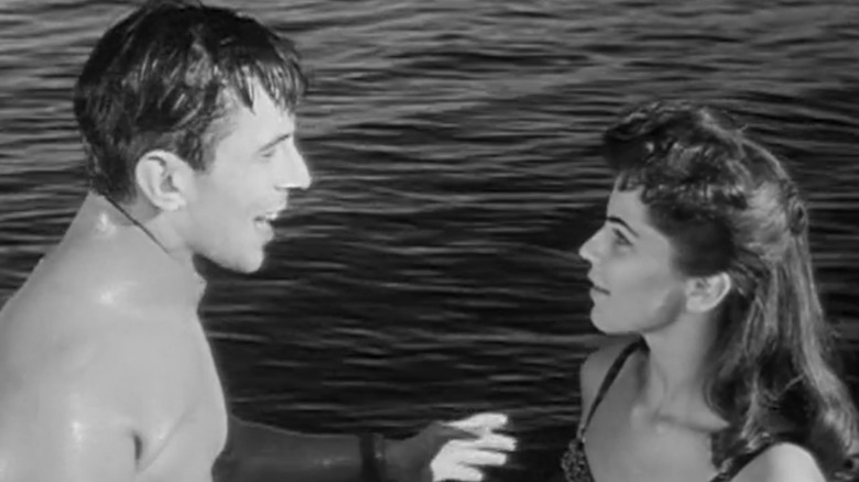 Leonard Nimoy's Jerry Wiley speaks to Lisa Gaye's Louise Wiley on the deck of a boat in Sea Hunt