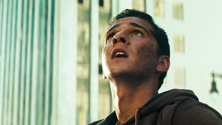 Shia LeBeouf as Sam Witwicky staring up at the sky in Transformers