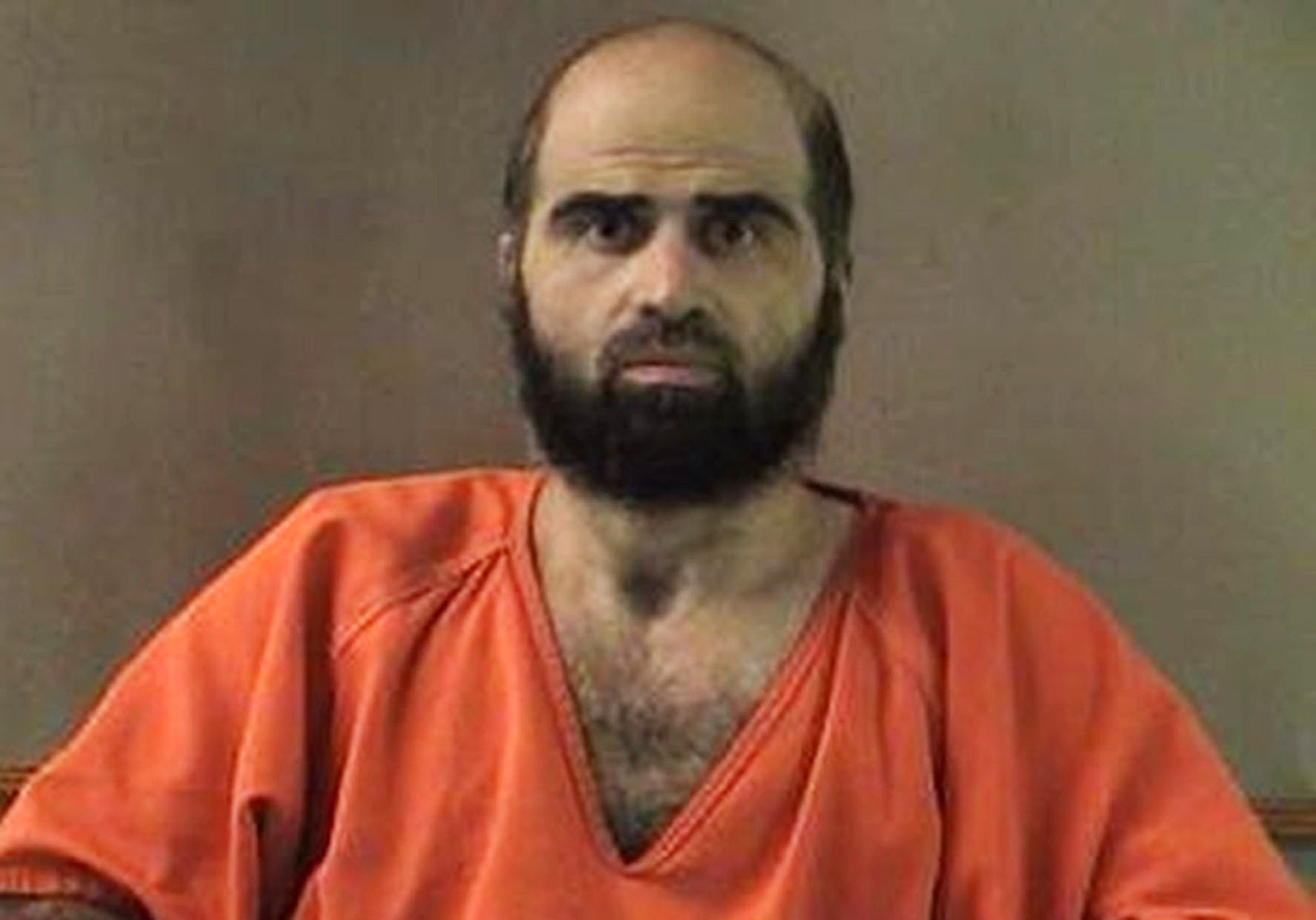 FILE - This undated file photo provided by the Bell County Sheriff's Department shows former Army psychiatrist Maj. Nidal Hasan. Hasan, who killed 13 people in a 2009 shooting spree at a Texas Army base, appeared in court Thursday, Jan. 29, 2015, at Fort Leavenworth, Kansas, where he is on military death row. (Bell County Sheriff's Department via AP, File)